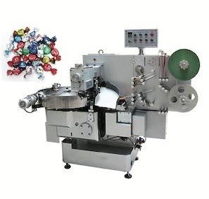 Auto feeder double twist flow pack machine